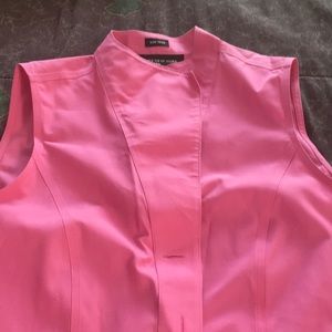 Pink ladies vest with 4 buttons.